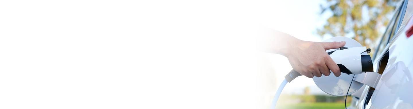 Electric vehicle being charged.